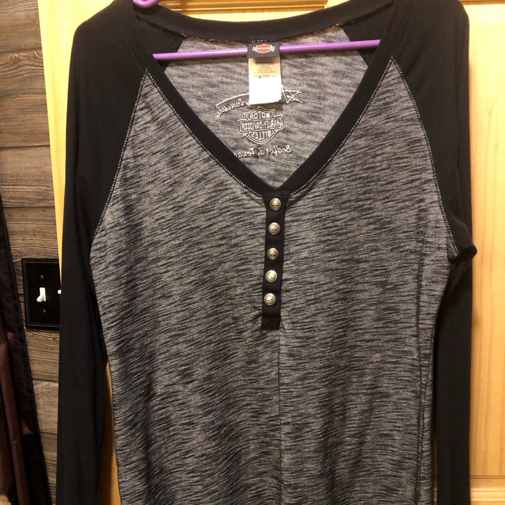 Women’s Harley Davidson Shirt with logo at bottom of shirt in the front
